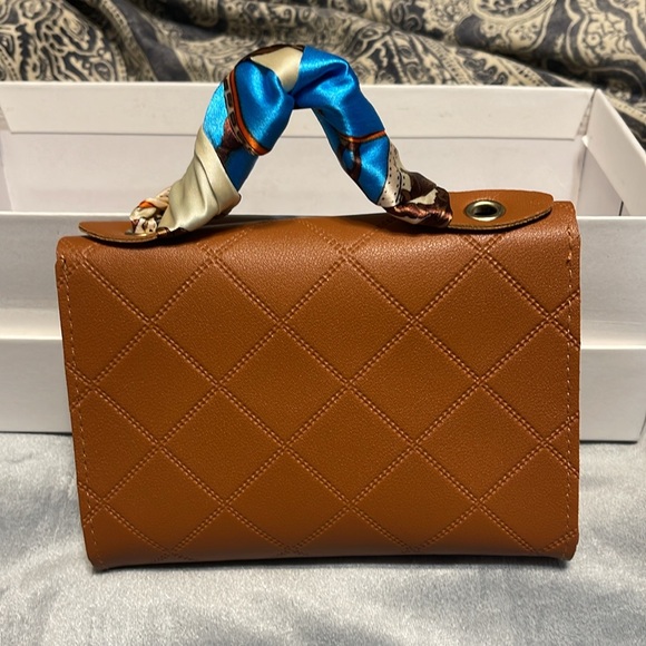 NWOT    5 inches x 7 inches petite bag.      brownish/Tannish - Picture 3 of 4